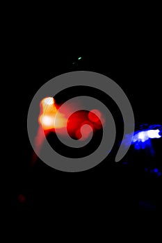 texture bokeh blue and red from the flashing lights of police cars and ambulances