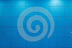 Texture of brick wall painted in blue