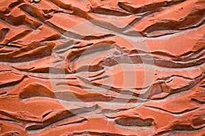 The texture of the bricks. Brick background. Background of bricks. Red decorative bricks. Vonous texture. Patterns. Reliefs