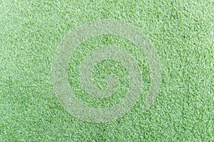 Texture of bright green artificial grass