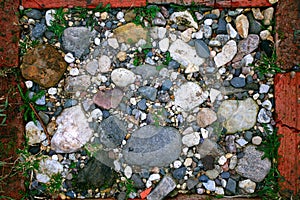 Texture of bright pebbles cobbles stones