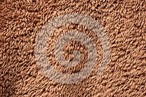 Texture of a brown faux fur as a background