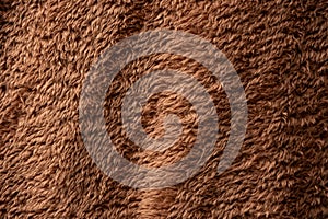 Texture of a brown faux fur as a background