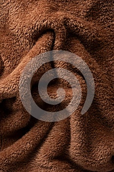 Texture of a brown faux fur as a background