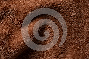 Texture of a brown faux fur as a background