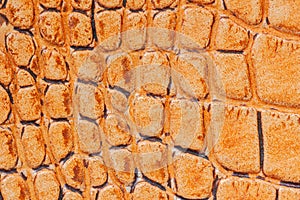 Texture of brown genuine leather embossed Reptile scales, trend pattern, natural background, copy space