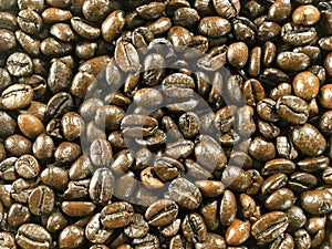 Texture of brown roasted coffee beans pattern