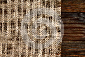 Texture of burlap bordered with old wood photo