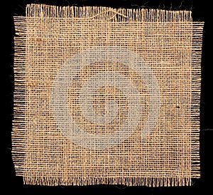 Texture of Burlap hessian on black background