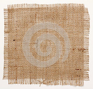 Texture of Burlap hessian square with frayed edges