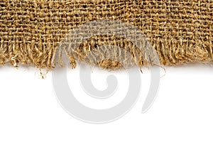 Texture of burlap on a white background close-up. Textile. fibers. Fabric with empty space for an inscription