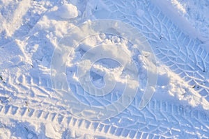 Texture of a car tire imprint on the snow