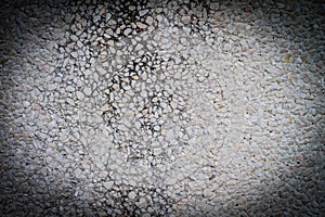 Texture of cement wall apply with pebble