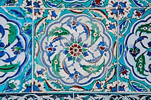 Texture of ceramic tiles in oriental East style. Turkish ceramic tiles lined on the wall. Old azulejo pattern floral