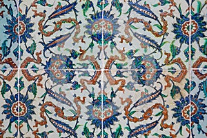 Texture of ceramic tiles in oriental East style. Turkish ceramic tiles lined on the wall. Old azulejo pattern floral