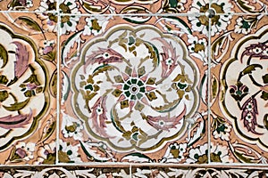 Texture of ceramic tiles in oriental East style. Turkish ceramic tiles lined on the wall. Old azulejo pattern floral