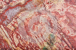 Texture closeup of dark and light red jasper