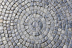 Texture of cobblestone in old town.