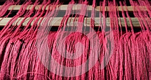 Texture of colorful threads in a handloom