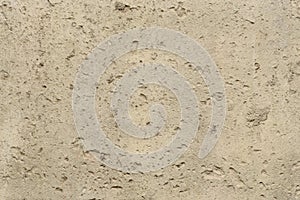 Texture of concrete with large and small holes for the background