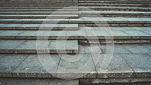 Texture of concrete steps. Stone staircase in centre of city. Outdoor stone steps background texture made of multitude