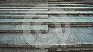 Texture of concrete steps. Stone staircase in centre of city. Outdoor stone steps background texture made of multitude slab