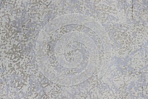 Texture of a concrete wall with decorative plasterwork of several colors