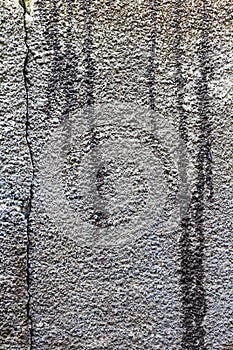 Texture concrete wall with stains of bitumen mastic. Abstract background