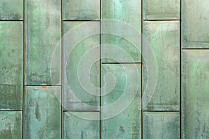Texture of copper plates with oxidized verdigris layer photo