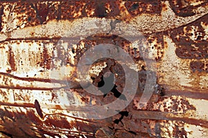 A texture of a corrosion pitting of rusty metal and a hole