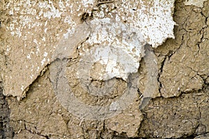 Texture of a cracked adobe wall