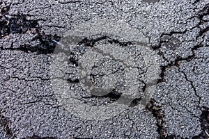 Texture of cracked asphalt pavement