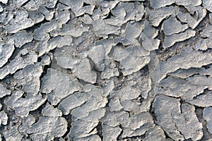 Texture of the crackled red clay in the desert