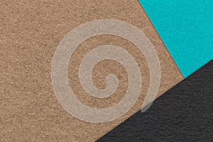 Texture of craft brown color paper background with turquoise and black border. Vintage abstract umber cardboard