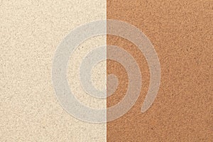 Texture of craft light beige and brown paper background, half two colors. Structure of vintage umber cardboard