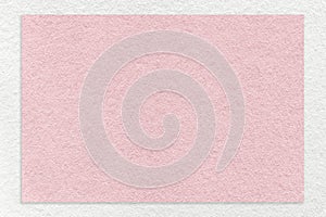 Texture of craft light pink color paper background with white border, macro. Vintage kraft rose cardboard