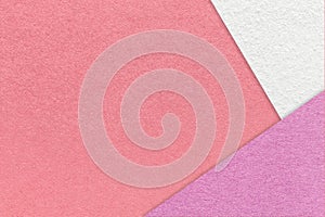 Texture of craft pink color paper background with white and lilac border. Vintage abstract rose cardboard