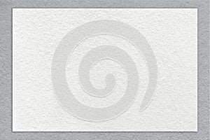 Texture of craft white color paper background with gray border, macro. Structure of vintage dense kraft cardboard