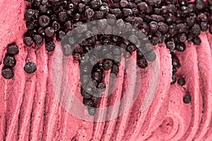 Texture of creamy ice-cream with blueberries close-up.
