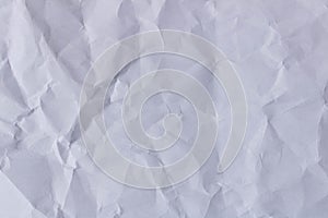 The texture of a crumpled sheet of paper . The background of a r