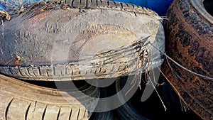 The texture of the damaged car wheels, rubber fiber wheels out