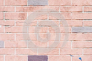 Texture of damaged cracked red brick wall. For modern background, pattern, wallpaper, banner design