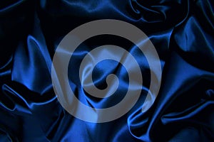 Texture of a dark blue silk