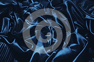 texture of a dark blue silk