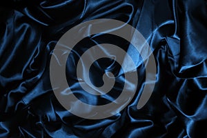 texture of a dark blue silk