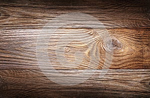 Texture of dark brown wood. Natural wooden background