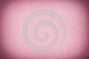 Texture of dark pink paper with unevenness and embossed close-up. Blank background for layouts.