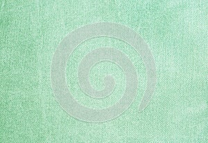 Texture of delicate fabric as background. Image in mint color