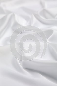 Texture of delicate white fabric as background, closeup