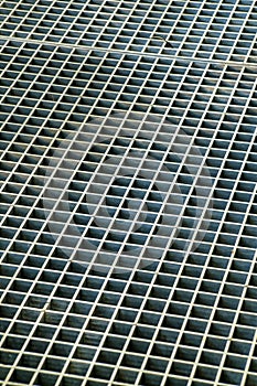 Texture or design image used for details with metal grate and geometric square pattern on vent or drain